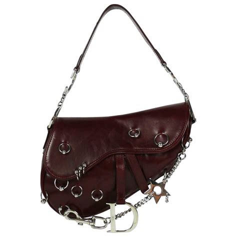 pierced dior saddle bag